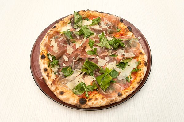 Pizza with rocket and prosciutto