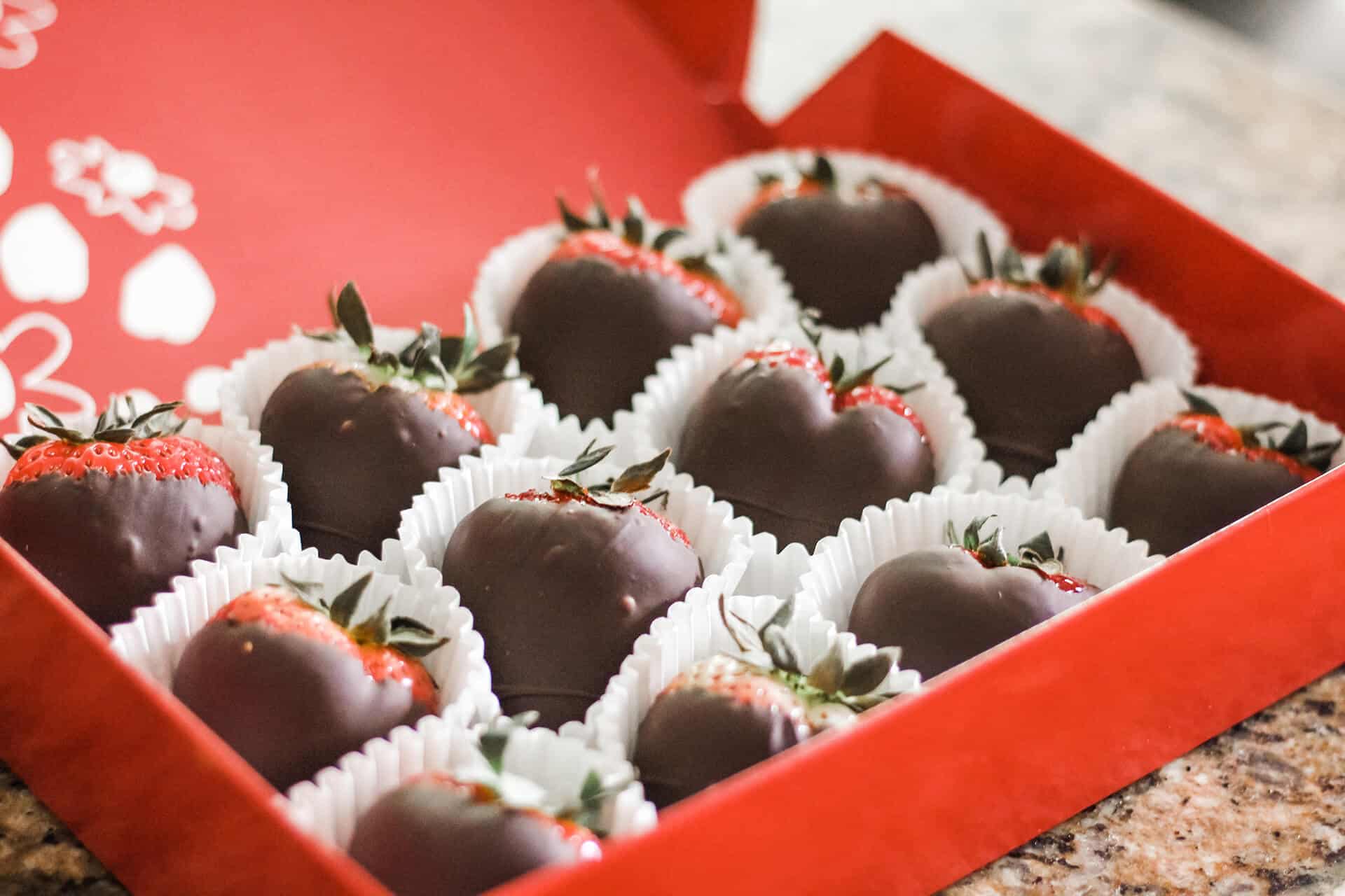 Chocolate coated strawberries in a box